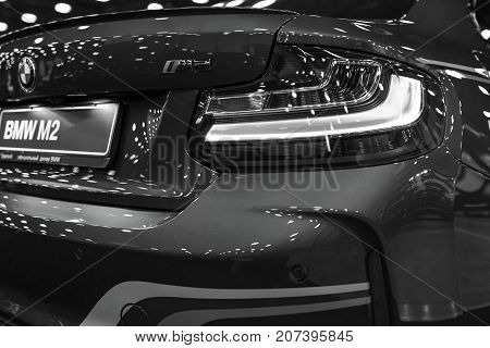Sankt-Petersburg Russia July 21 2017: Back view of a BMW M2 sports car. M Performance Edition. Car exterior details. Black and white. Photo Taken at Royal Auto Show July 21