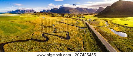 Aerial view of a scenic road through villages and mountains on Lofoten islands in Norway