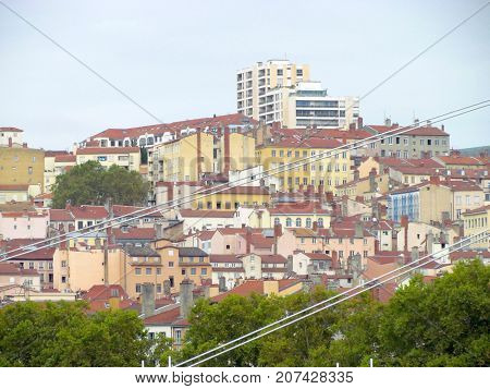 Cityscape view on top hill La Croix-Rousse ginger cross neighborhood of Lyon France with colorful houses and buildings
