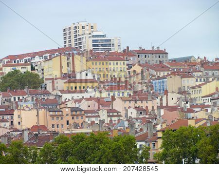 Cityscape view on top hill La Croix-Rousse ginger cross neighborhood of Lyon France with colorful houses and buildings