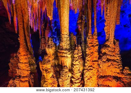 Venetsa cave in Bulgaria with onyx stones. Illuminated flowstones, stalactites and stalagmites