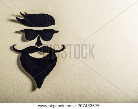 Hipster's definicial facial look cut from paper.