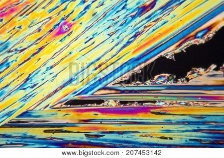 microscopic shot of urea micro crystals in polarized light