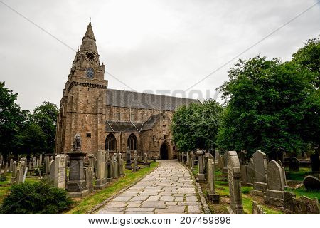 Aberdeen, Scotland, June 2017: A road to St Machar cathedral entrance near Seaton park