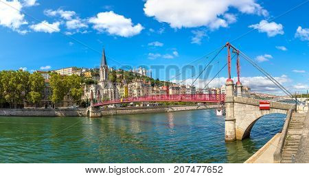 Pedestrian Saint Georges Footbridge And The Saint Georges Church In Lyon France In A Beautiful Summe