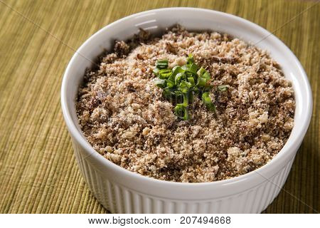 Farofa, A Toasted Cassava Flour Mixture.