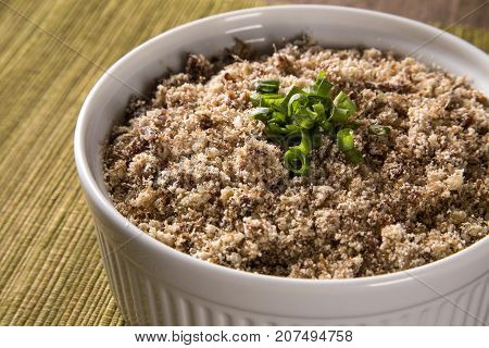 Farofa, A Toasted Cassava Flour Mixture.
