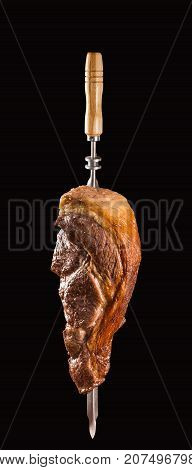 Alcatra traditional Brazilian barbecue. black in background