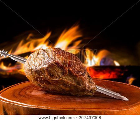 Cupim traditional Brazilian barbecue. fire in background