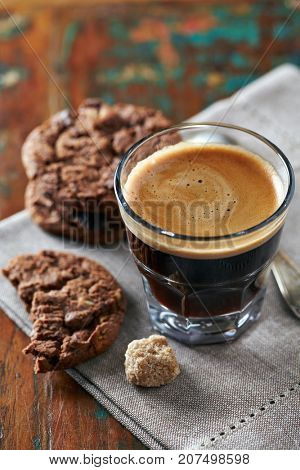 Chocolate cookies and a glass of espresso
