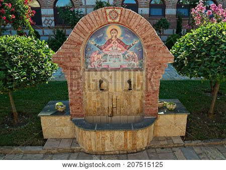 Fountain in garden of orthodox monastery in Kac, serbia