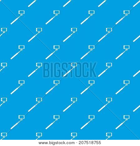 Selfie stick and smartphone pattern repeat seamless in blue color for any design. Vector geometric illustration