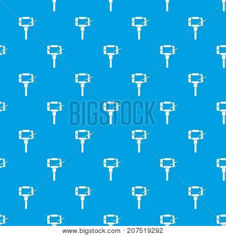 Taking pictures on smartphone on selfie stick pattern repeat seamless in blue color for any design. Vector geometric illustration