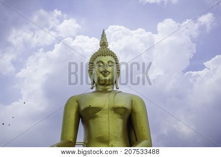 The big golden Buddha statue in Muang temple Ang Thong Thailand.