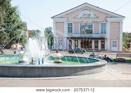 Konotop,Sumy region,Ukraine,  AUGUST  14, 2013: Town Square with theater and a fountain in the city Konotop