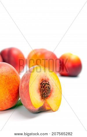 Ripe peach (nectarine) isolated on white background