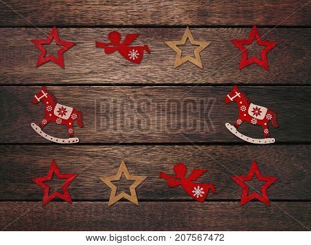 Christmas frame with retro styled toys on wooden background
