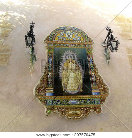 a religious fesquo in the streets of seville ( spain )
