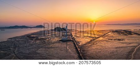 Aerial View Sunset Of Wind Turbine In Daebudo Island,south Korea.
