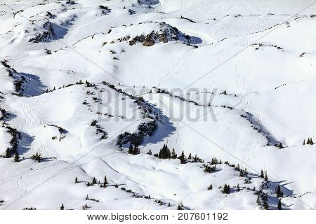 Snow mountains winter landscape at Ifen ski resort. Mountain station hut with ski slope and cablecar. Bavaria, Germany.