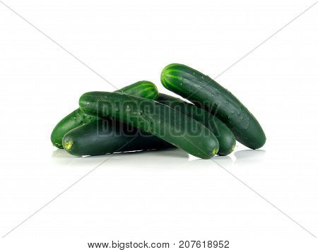 Fresh green cucumbers isolated on white background. Group of cucumbers.