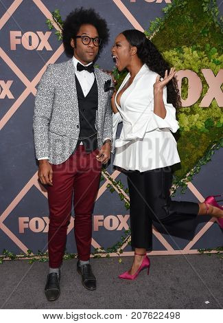 LOS ANGELES - SEP 25:  Johnathan Fernandez and Michelle Mitchenor arrives for the FOX Fall Party on September 25, 2017 in West Hollywood, CA                