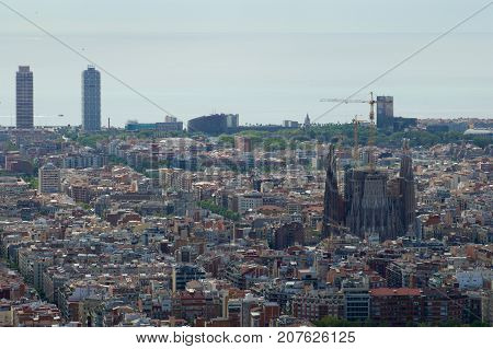 BARCELONA, SPAIN - AUG 30th, 2017: wide angle of barcelona shot from the bunkers de carmel offering amazing panoramic views over the city skyline.