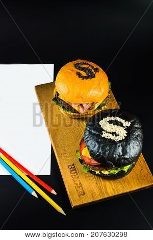 Two Crafting A Burger On The Board