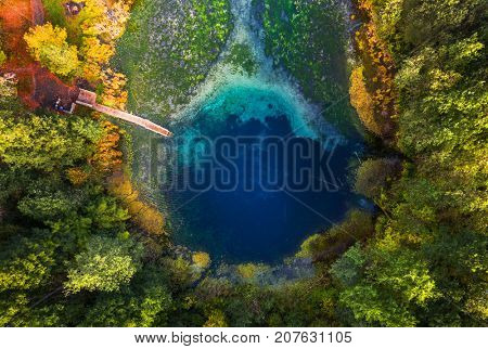 Aerial view of the karst lake named Goluboye Ozero (Blue Lake) 