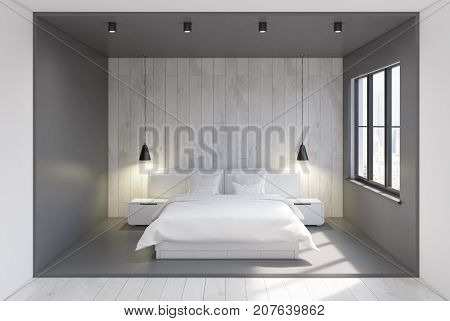 Front view of a modern bedroom interior with gray and woden walls a concrete and wooden floor and two bedside tables near a double bed. 3d rendering mock up