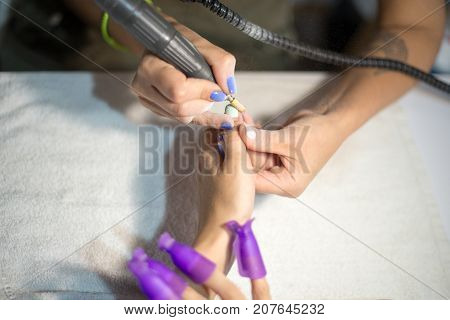 Hardware Manicure. Removal Of Old Gel Varnish In The Salon. Manicure Master Doing Beauty Procedure F