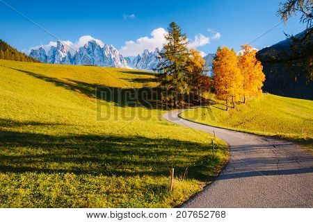 Magic image of alpine hills in Santa Magdalena village. Peaceful rural scene. Location famous place Funes valley, Odle Group, Dolomiti Alps. Bolzano province, South Tyrol, Italy. Europe. Beauty world