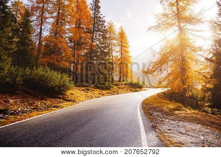 Stunning image of the alpine road. Dramatic morning scene, gloomy weather. Location famous place National Park Tre Cime di Lavaredo, Misurina, Dolomiti alps, South Tyrol, Italy, Europe. Beauty world.