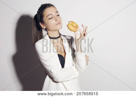 Brunette Girl With A Classic Glase Donut.