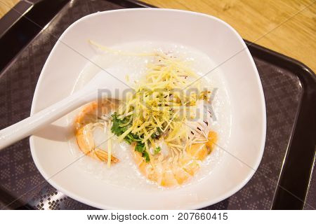 Close up of shrimp porridge on bowl