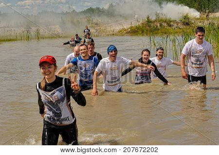 Athletes Creep Under Barbed Wire. Tyumen. Russia
