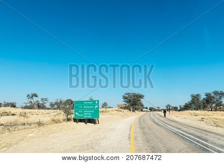 ASKHAM SOUTH AFRICA - JULY 6 2017: A directional sign on the R360-road from Tweerivieren in the Kgalagadi at the junction with the R31-road in the Northern Cape Province of South Africa
