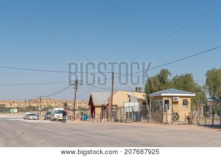 ASKHAM SOUTH AFRICA - JULY 6 2017: A street scene with buildings and vehicles in Askham a small town in the Northern Cape Province of South Africa