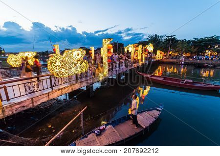 Hoi An, Vietnam - August 14, 2015: bridge over the Thu Bon river in the UNESCO World Heritage city of Hoi An.