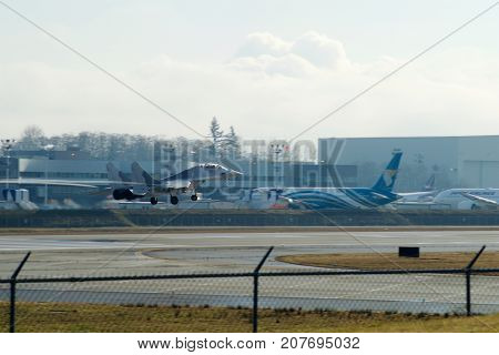EVERETT, WASHINGTON, USA - JAN 26th, 2017: A MiG-29UB during a low pass athe Boeing factory site at Snohomish County Airport or Paine Field.