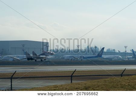 EVERETT, WASHINGTON, USA - JAN 26th, 2017: A MiG-29UB during a low pass athe Boeing factory site at Snohomish County Airport or Paine Field.
