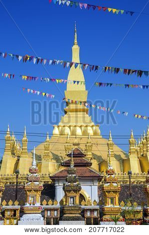 That Luang Stupa, Landmark Of Vientiane, Lao Pdr, Decorated With Colourful Pennant Banners During An