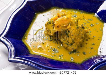 Pequi Fruit With Chicken Over A Wooden Table. Frango Com Pequi.