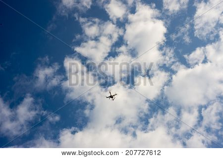 View of a photography drone on a blue sky