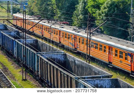 TRZEBINIA POLAND - AUGUST 19 2017: Freight and passenger train at the railway station in Trzebinia Poland.