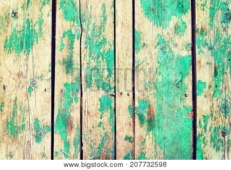 Vintage wood background with peeling paint texture