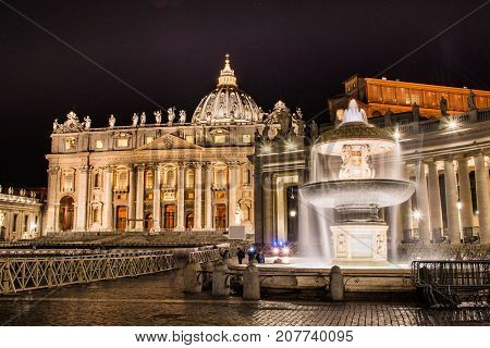 ROME ITALY 25 April 2017. St Peters Basilica and Maderno's fountain at night.