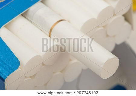 cigarette, cigarette on white background, pack of cigarettes, close-up of a cigarette