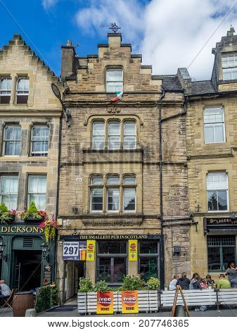 EDINBURGH, SCOTLAND - JULY 30: Buildings and shops in the famous Grassmarket ares of the Old Town on July 30 2017 in Edinburgh, Scotland. The Grassmarket  is a popular area of Edinburgh.