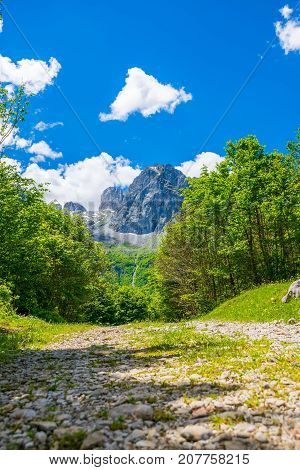 In The Mountains Lies A Winding Rocky Road.